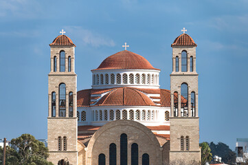 Church of Agion Anargyron showing its terracotta dome and bell towers in Paphos, Cyprus