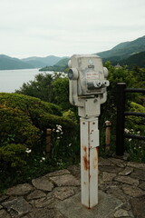 coin operated binoculars on mountain