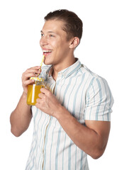 Fototapeta premium Man drinking juice through straw on white background