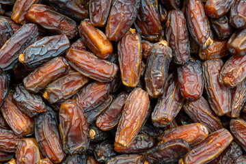 Close-Up of Organic Dried Dates in a Rustic Background