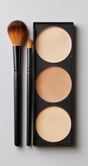 Three-toned face powder palette and brushes