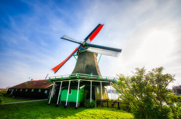 Old Windmill on the River Zaan Riverside at Beautifull Zaanse Schans, Netherlands