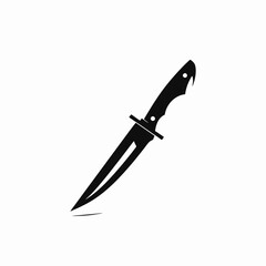 Obraz premium Menacing hunting knife with a sharp point in striking black silhouette