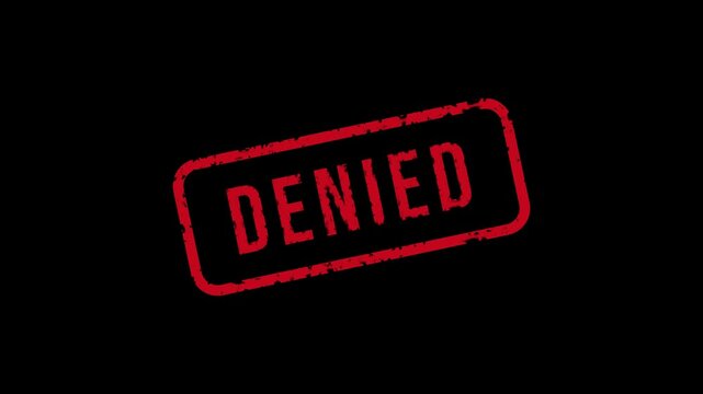 Vintage Denied Stamp on black background. Denied stamp with vintage red rubber ink. 4k video