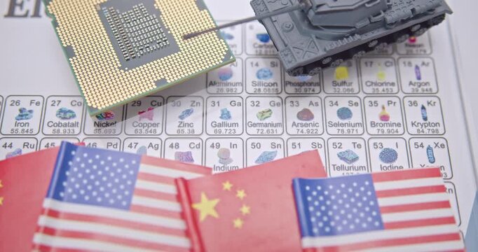 Global tensions in the China&ndash;U.S. semiconductor trade and tech war, critical mineral control (e.g. gallium, germanium) : A CPU chip, a tank and flags of China and the US placed over a periodic table.	