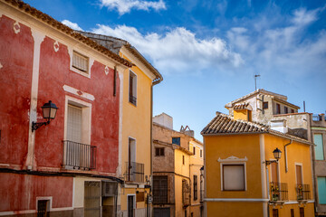 Typical street in the old town of Cehegin, Murcia Region, Spain, with colorful facades