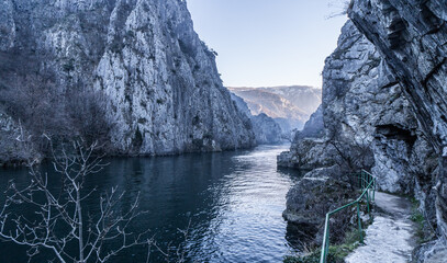 Matka Macedonia - A Calm river between high rocky cliffs in winter.