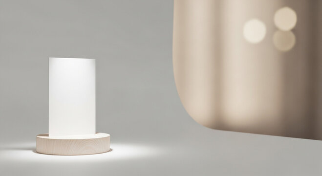 Minimalist product photography features a glass cylinder lamp atop a wood base. The image has a neutral color palette and is intended for creative and product design.

