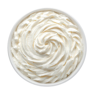 Creamy swirls of frosting in a white bowl