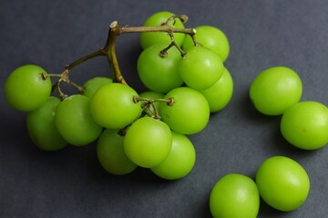 Fresh Green Muscat Shine Grapes on Dark Background
