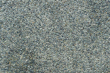 小石とコンクリートの壁面。背景・テクスチャ素材