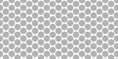 A vintage gray polka dot vector seamless pattern with geometric honeycomb shapes