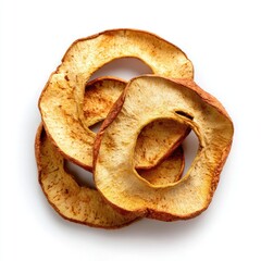 Dried apple rings, stacked on white background