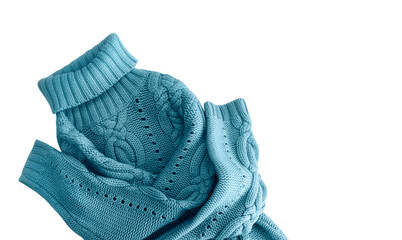 Blue knitted winter sweater isolated on white.