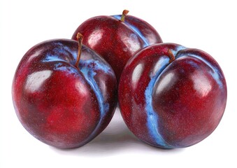 Three plums, vibrant red-purple with hints of blue, clustered together against a white background.  Their smooth surfaces and slightly uneven textures are visible
