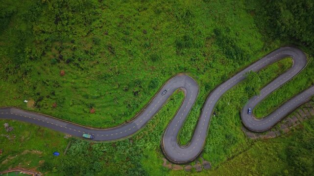 Serpentine road across limestone highlands &ndash; cinematic aerial