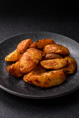 Potato wedges baked with spices, garlic and rosemary. Potato wedges