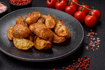 Potato wedges baked with spices, garlic and rosemary. Potato wedges