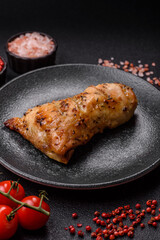 Chicken leg, quarter grilled with spices and rosemary. Chicken leg