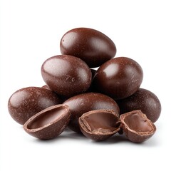 Pile of dark chocolate eggs, some broken open, on white background
