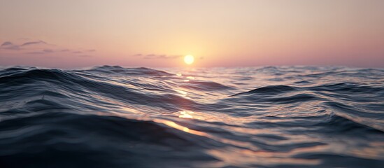 Sunrise over rippling ocean waves