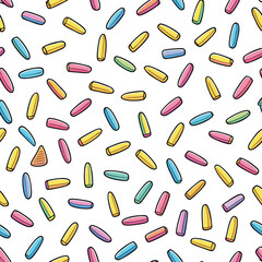 Seamless pattern of colorful sprinkles isolated on white background, a sweet and decorative topping for desserts