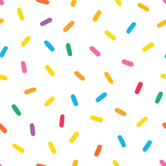 Colorful sprinkles seamless pattern isolated on white background, a sweet and decorative topping for desserts and treats