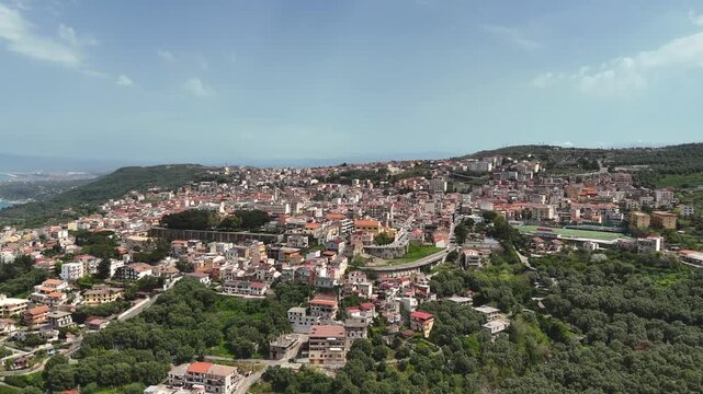Aerial shot leading into Palmi, Italy