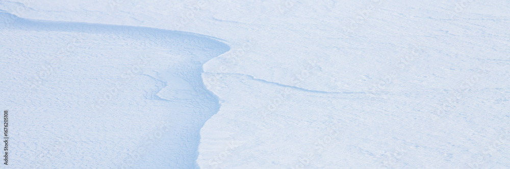 Canvas Prints beautiful winter background with snowy ground. natural snow texture. wind sculpted patterns on snow 