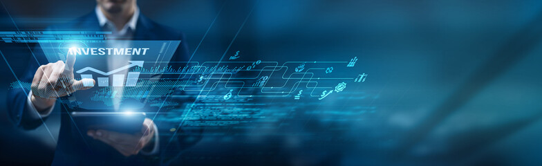 Financial advisor using a smart tablet for performance monitoring investment portfolios, market...