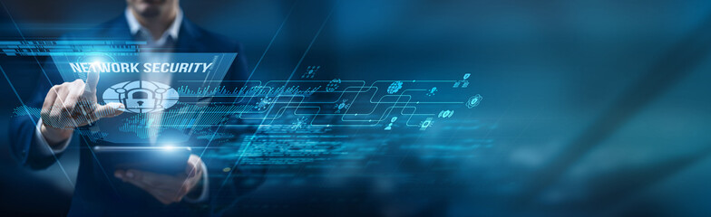 Cybersecurity officer using a smart tablet for performance monitoring network security protocols,...