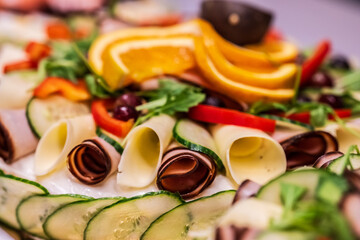 Decorative sandwich cake with cheese and fruit.