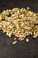 Seed mix sunflower seeds and pumpkin seeds natural product tasty snack fresh delicious gourmet food background on the table rustic top view copy space keto and paleo diet vegan and vegan food