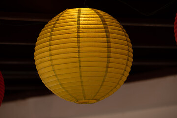Yellow Oriental decorative lantern in the evening