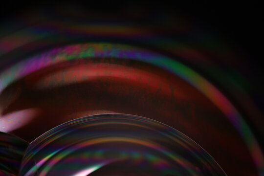 Multicoloured chemical liquid surface, phenomenal abstract photography, interference pattern, glossy reflection