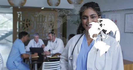 Woman doctor smiling initiating globe overlay showing health network while team discussing charts - Powered by Adobe