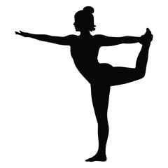 Woman performing natarajasana yoga pose silhouette