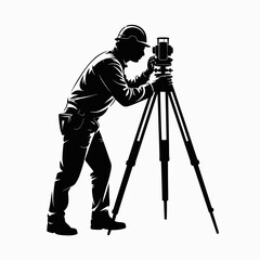 Surveyor in hard hat using a theodolite on a tripod