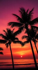 Obraz premium Vibrant tropical sunset with silhouetted palm trees against a fiery orange and purple sky