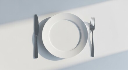 Plate with cutlery on the table