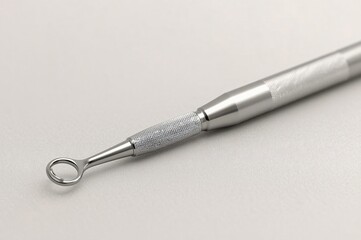 Sterile loop tool on white background, medical lab