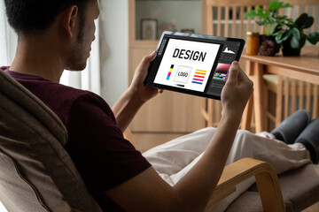 Graphic designer software for modern design of web page and commercial ads showing on the computer screen