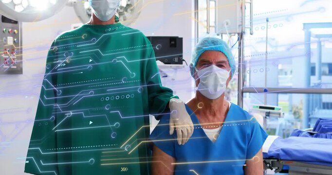 Digital circuit graphics sweeping across OR while surgeon placing hand on peer for support