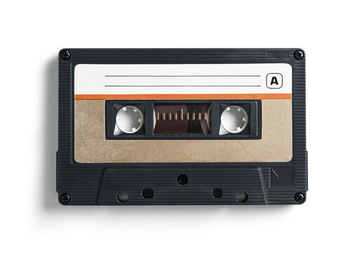 An isolated vintage-style cassette tape casting a soft shadow that emphasizes its presence and shape on a flat surface.