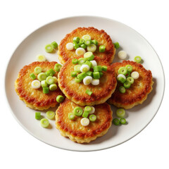 Crispy golden potato pancakes topped with fresh chopped green onions served on a white plate transparent background