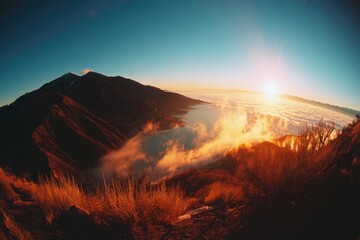 Sunrise over mountain range, cloud sea