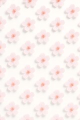 Seamless Pattern of Soft Pink Flowers Arranged Neatly on Light Background for Fresh and Clean Design