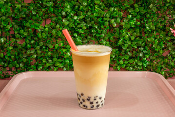 Sweet Peach Iced Tea: Vibrant blend of black tea with peach juice, garnished with fruit segments and mint for a refreshing touch