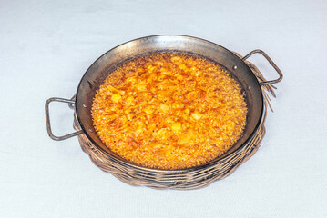 White fish paella with monkfish and hake, cooked with homemade stock that permeates every grain of rice