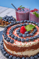 Cold Red Velvet Cake: Sponge cake moistened with vanilla syrup and blueberries macerated in orange juice